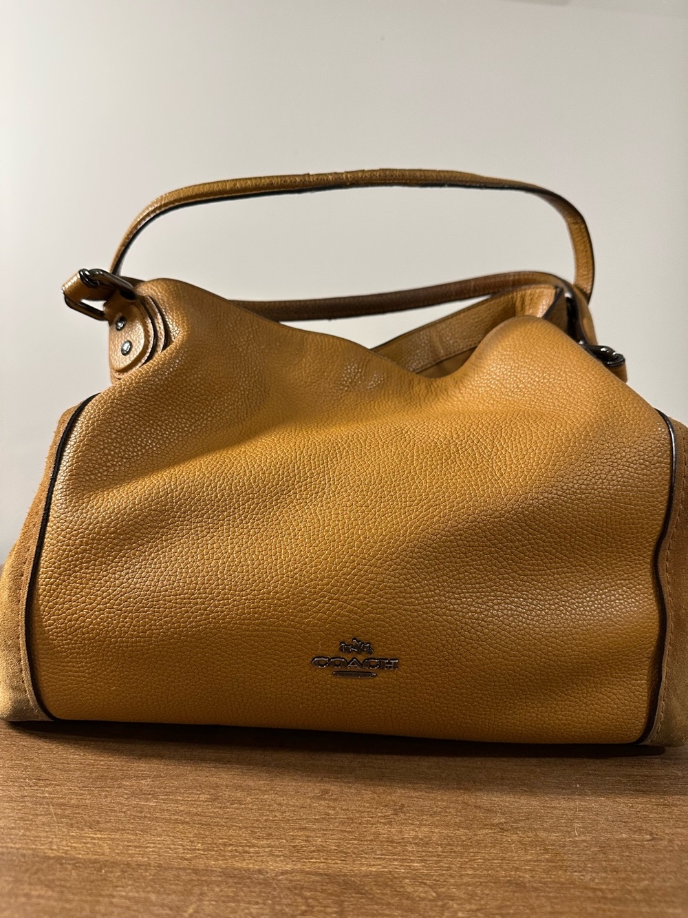 Coach Edie 31 shoulder bag crafted from Pebbled Leather and Suede.